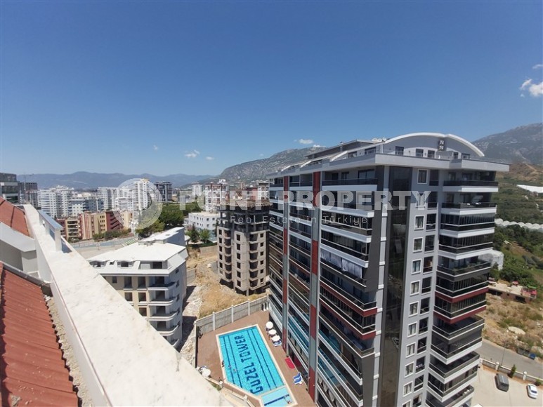 Панорамная двухуровневая квартира с видом на Торосские горы, в 700 метрах от моря, в центре района Махмутлар-id-5956-фото-19