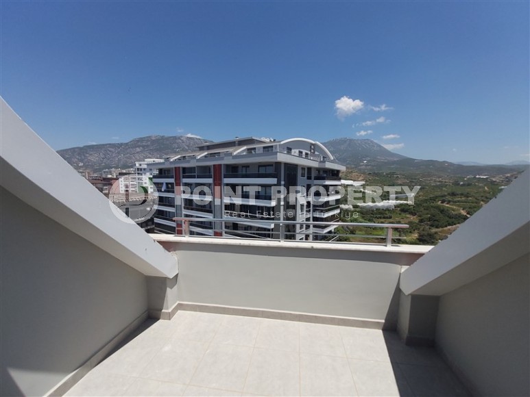 Панорамная двухуровневая квартира с видом на Торосские горы, в 700 метрах от моря, в центре района Махмутлар-id-5956-фото-18