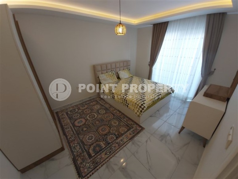 Spacious two-level apartment, on an area of 200 m2, in the center of a modern, developed area of Alanya - Mahmutlar-id-5958-photo-4