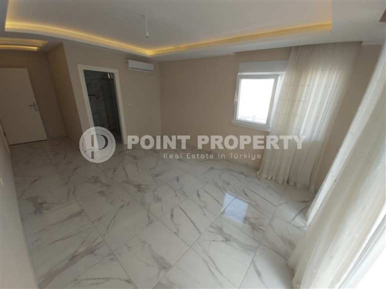 Spacious two-level apartment, on an area of 200 m2, in the center of a modern, developed area of Alanya - Mahmutlar-id-5958-photo-5